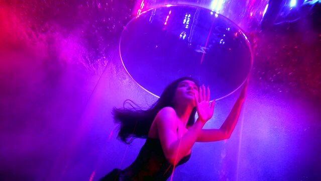 dreamy underwater shot with beautiful brunette lady in sexy swimsuit, fantasy and fairytale
