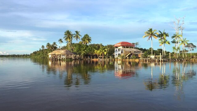 Simple houses on the banks of Orinoco river in Orinoco delta, Venezuela.