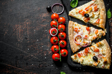 Fragrant slices of pizza on a cutting Board.