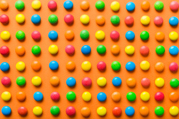colorful candies as background top view. Seamless pattern with candy. Many sweet candies close-up