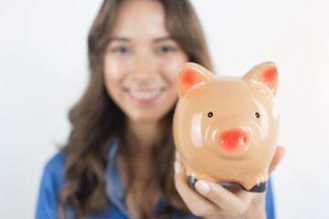 Savings Happy Woman Holding a Piggy Bank Investments