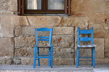 Traditional Greek taverna blue chairs