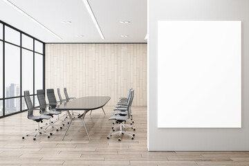 Front view on blank white poster with place for your logo or text on light grey wall in spacious conference room with glass meeting table and wooden wall background. 3D rendering, mock up