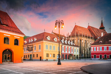 Brasov, Romania. Black Church and Council Square, night view, beautiful Transylvania travel place.