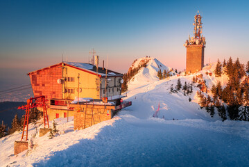 Poiana Brasov, Romania. Postavaru Mt. in Carpathians, winter landscape.