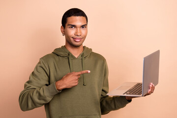 Photo of young experienced senior it developer python programmer man wear khaki hoodie direct...