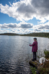 Woman fishing on the lake