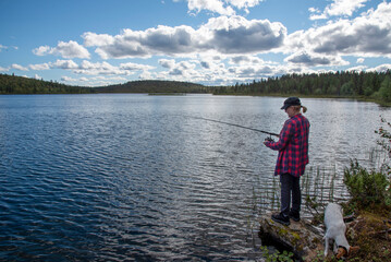 Woman fishing on the lake