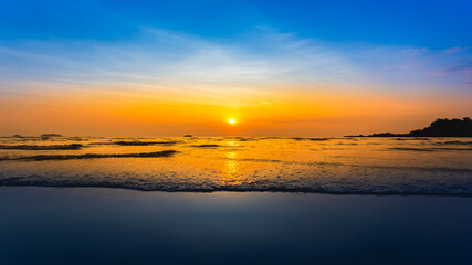 Beautiful sunrise on the beach and sea Holiday Vacation concept