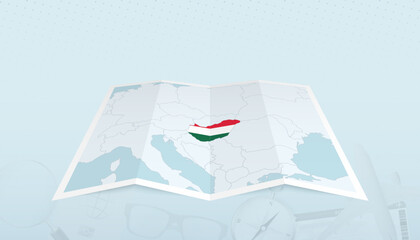 Obraz premium Map of Hungary with the flag of Hungary in the contour of the map on a trip abstract backdrop.