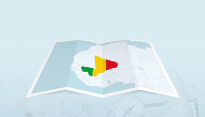 Map of Mali with the flag of Mali in the contour of the map on a trip abstract backdrop.