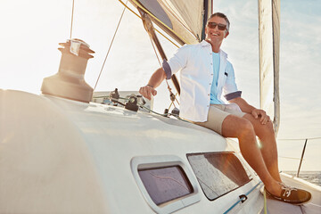 Summer, holiday and man on a yacht for sailing, nature adventure and ocean cruise in Italy. Relax, happy and person on a luxury boat for outdoor zen, vacation and happiness on the water with a smile - obrazy, fototapety, plakaty