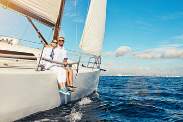 Sea, portrait and mature couple on a yacht for adventure, holiday freedom and sailing trip. Travel,...