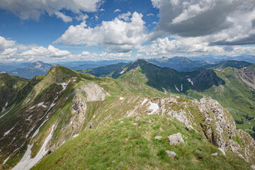 Fototapeta na wymiar Beautiful nature. Mountain hiking Trail Road. Italy Lago Avostanis Casera Pramosio Alta