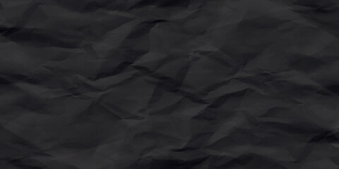 Black creased crumpled paper texture can be use as background. Ragged black Paper. black waxed packing paper texture.