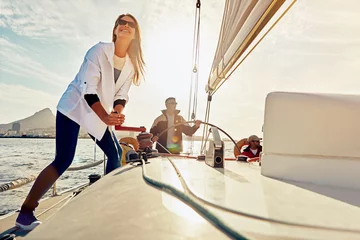 Foto op Canvas Boat, couple and sea travel, retirement holiday and wealth investment for hobby and steering wheel teamwork. Rich, fun and sailing of happy, mature people on ocean or lake water for outdoor adventure © Reese/peopleimages.com