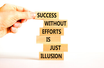 Success symbol. Concept words Success without efforts is just illusion on wooden blocks on a beautiful white table white background. Businessman hand. Business success and efforts concept.