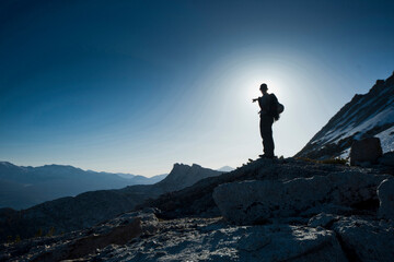 Silhouette of backpacker,Â TuolumneÂ Meadows, Yosemite National Park,Â California, USA
