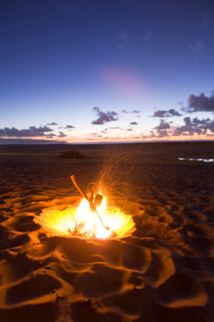 fire on the beach at Pipeline