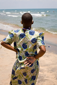 A teenager looks out to a brighter future across Lake Malawi, where waves have a sound for the first time and new hope abounds.