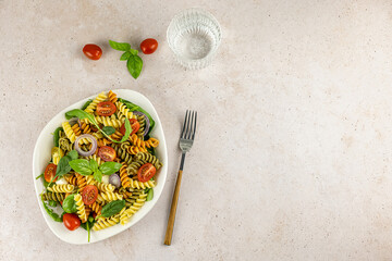 Pasta or noodle salad from wheat and lentils fusilli. Lunch or dinner meals are full of carbohydrates, protein, and dietary fiber. 