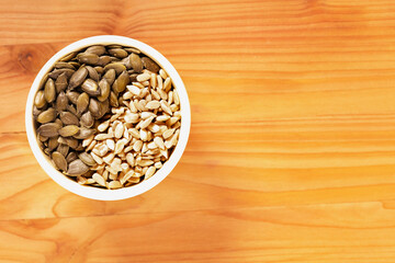  Pumpkin and sunflower seeds in bowl