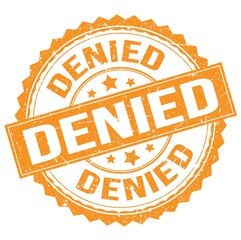 DENIED text on orange round stamp sign