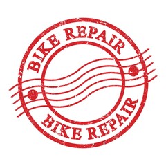 BIKE REPAIR, text written on red postal stamp.