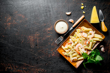 Pasta with shrimp, Parmesan and mint leaves.