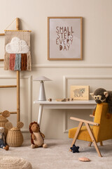 Creative composition of children room interior with mock up poster frame, white desk, yellow armchair, plush toys, pouf, wicker basket, ladder, gray lamp and personal accessories. Home decor. Template