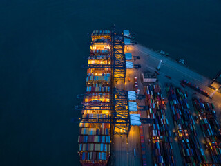 Aerial view of container terminal at night