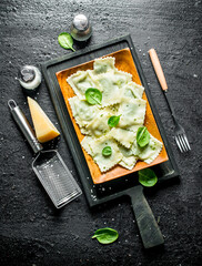 Ravioli with paremesan, spices and spinach.