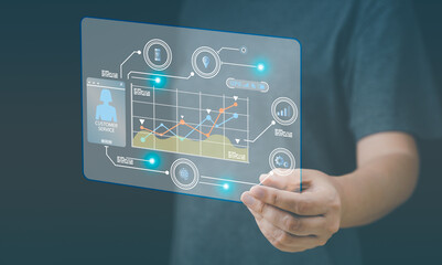 Analyst working with Business Analytics and Data Management System on computer, make a report with KPI and metrics connected to database. Corporate strategy for finance, operations, sales, marketing.