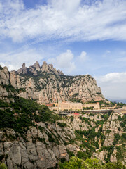 Fototapeta na wymiar View of the mountains and church in Montserrat, Barcelona, Spain.