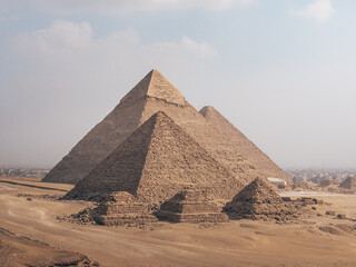View of the pyramids in Giza, Cairo, Egypt from the desert side.