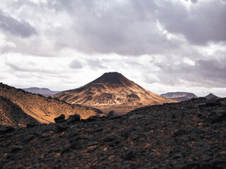 A volcanic hill in the Black Desert, Egypt.