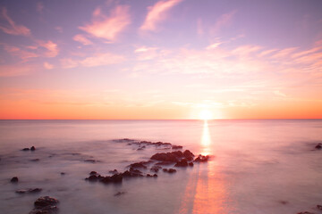Fototapeta na wymiar landscape at sunset in the beautiful Nazare north beach.