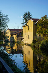 Old buildings along the Martesana canal at Milan
