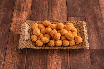 Popcorn chicken is a dish consisting of small bite-sized pieces of chicken that have been breaded and deep-fried