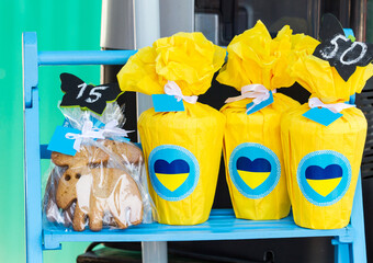 Sets of sweets in Ukraine color packaging for sale at a food festival