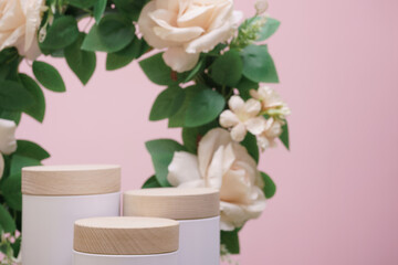 wood podium beige rose flowers on pink pastel background with space.beauty cosmetic skin care advertising stage,luxury romantic love valentines or mother gift, product pedestal platform stand display.