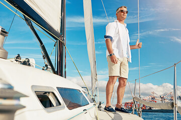 Sea travel and man on yacht thinking of adventure, holiday and freedom in summer sunshine. Relax,...