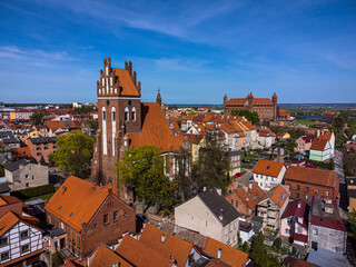 Gniew Castle with a view of fields, church and town