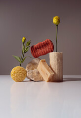 Elegant Still Life of premium natural bath products shot in studio with flower decor