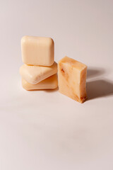 Elegant Still Life of premium natural bath products shot in studio with flower decor