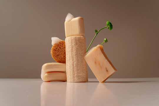 Elegant Still Life of premium natural bath products shot in studio with flower decor