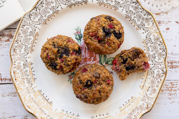 vintage plate of berry muffins