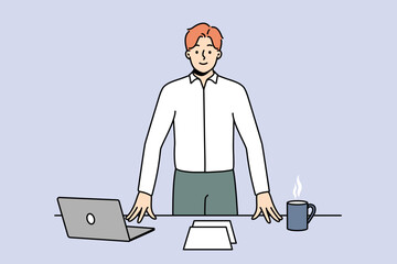 Smiling successful young businessman near office desk with laptop. Happy confident male CEO or boss with computer and coffee on table at workplace. Vector illustration. 