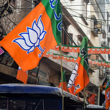 Delhi, India, December 02 2022 -Bharatiya Janata Party (BJP) supporter during mega road show in support of BJP candidate Pankaj Luthara to file nomination papers ahead of MCD local body Elections 2022