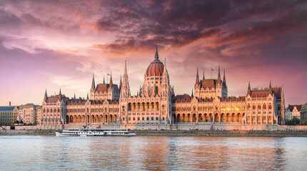 Fototapeta na wymiar Panorama of the Hungarian Parliament building at sunrise in Budapest, Hungary